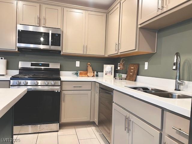 302 Bay Village Pl, Henderson, NV 89011 - kitchen with appliances with stainless steel finishes and light countertops