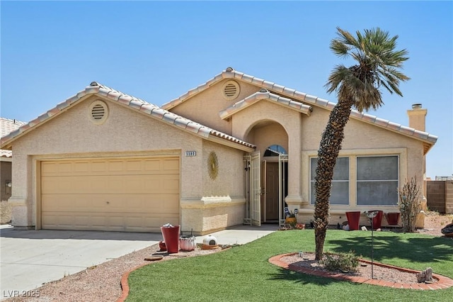 5580 Lonesome Biker Ln, Las Vegas, NV 89113 - mediterranean / spanish-style home featuring a garage, concrete driveway, stucco siding, and a tiled roof