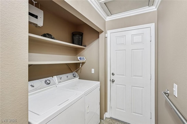 5580 Lonesome Biker Ln, Las Vegas, NV 89113 - washroom with washing machine and dryer, attic access, and crown molding