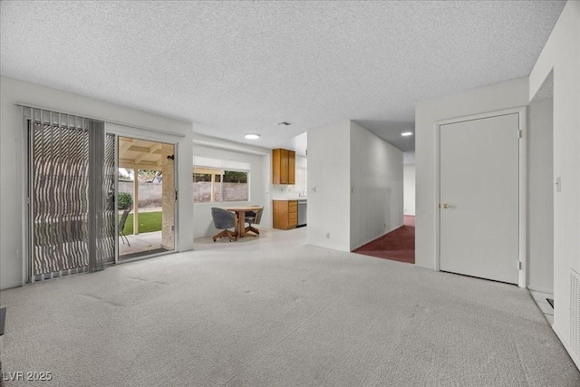 2344 Valleywood St, Henderson, NV 89014 - unfurnished living room with carpet and a textured ceiling