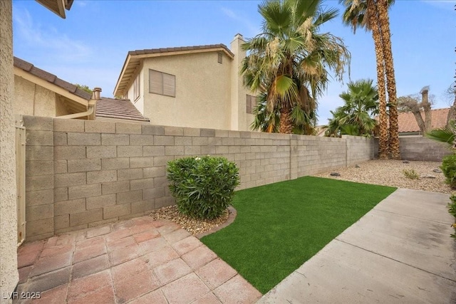 2344 Valleywood St, Henderson, NV 89014 - fenced backyard with a patio