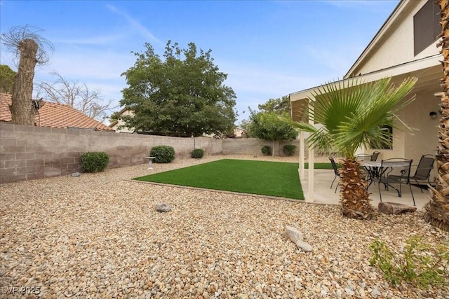 2344 Valleywood St, Henderson, NV 89014 - fenced backyard with a patio