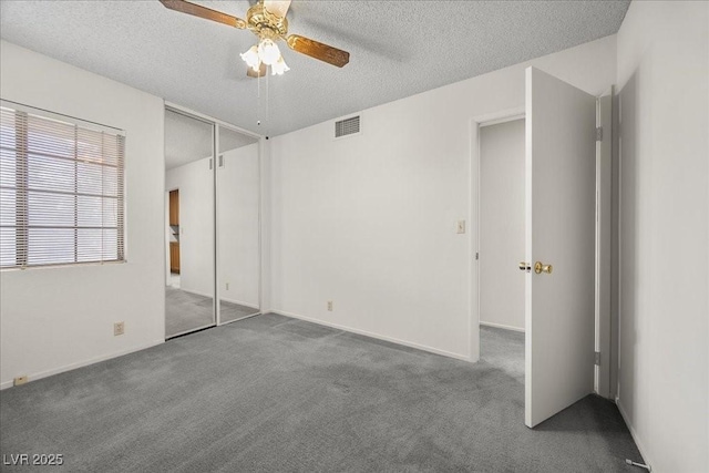 2344 Valleywood St, Henderson, NV 89014 - unfurnished bedroom with carpet, a textured ceiling, a ceiling fan, and a closet
