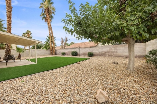 2344 Valleywood St, Henderson, NV 89014 - fenced backyard with a patio area