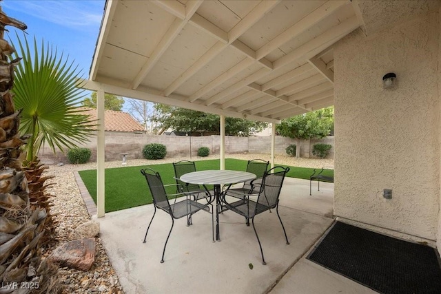 2344 Valleywood St, Henderson, NV 89014 - fenced backyard featuring outdoor dining area and a patio area
