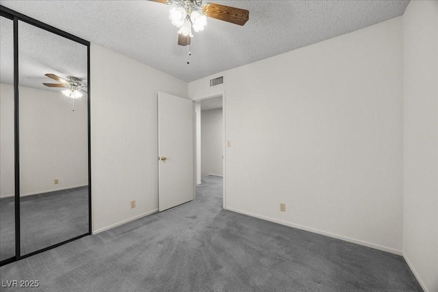 2344 Valleywood St, Henderson, NV 89014 - unfurnished bedroom featuring a closet, carpet floors, ceiling fan, and a textured ceiling