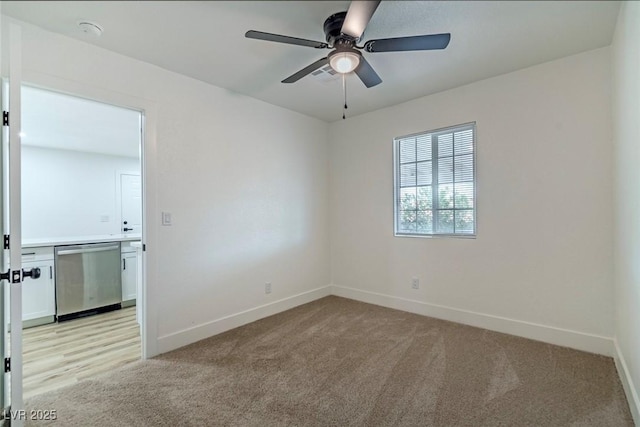 732 N 9th St, Las Vegas, NV 89101 - spare room featuring light carpet, a ceiling fan, and a smoke detector