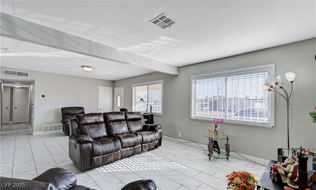 824 Salem Dr, Las Vegas, NV 89107 - living room featuring light marble finish floors and baseboards