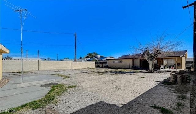 824 Salem Dr, Las Vegas, NV 89107 - fenced backyard with a patio area