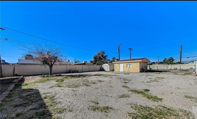 824 Salem Dr, Las Vegas, NV 89107 - fenced backyard with a storage shed