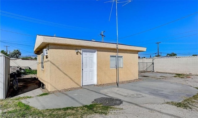 824 Salem Dr, Las Vegas, NV 89107 - rear view of property featuring a patio, a fenced backyard, and stucco siding