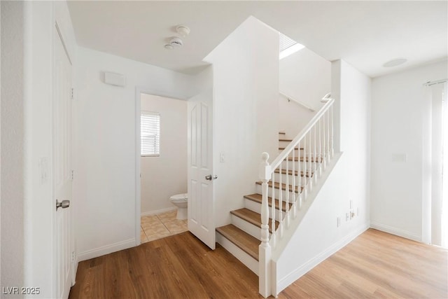 1161 Gecko Rd, Henderson, NV 89002 - stairs featuring wood finished floors and baseboards