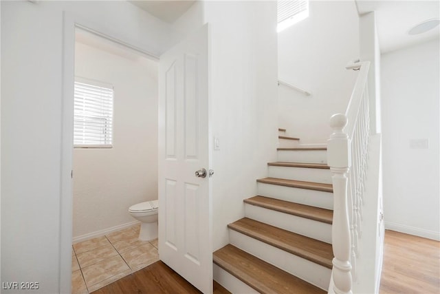 1161 Gecko Rd, Henderson, NV 89002 - stairs featuring wood finished floors and baseboards