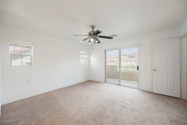 1161 Gecko Rd, Henderson, NV 89002 - empty room featuring light colored carpet and a ceiling fan