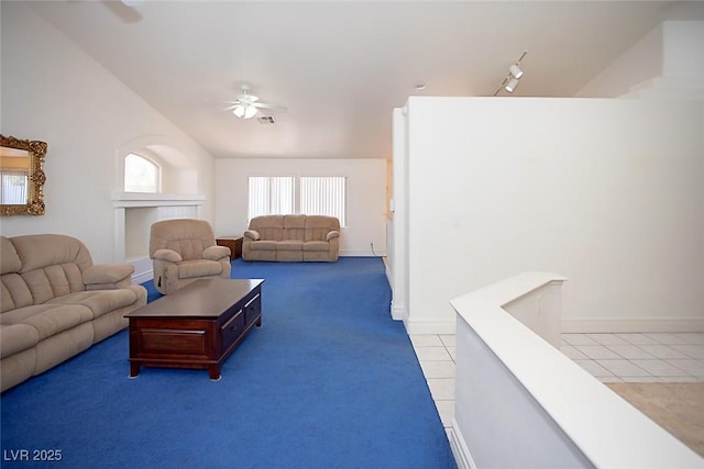 6249 Halehaven Dr, Las Vegas, NV 89110 - carpeted living area with ceiling fan, tile patterned flooring, and lofted ceiling