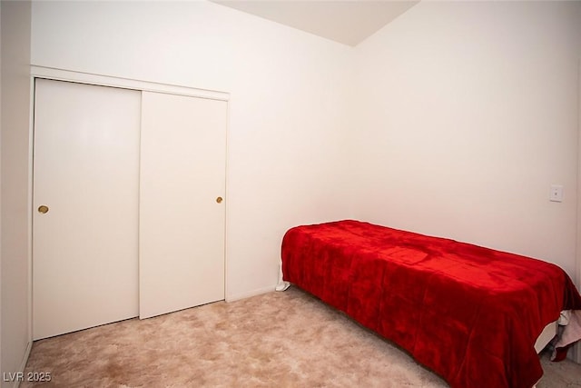 6249 Halehaven Dr, Las Vegas, NV 89110 - carpeted bedroom with a closet and baseboards