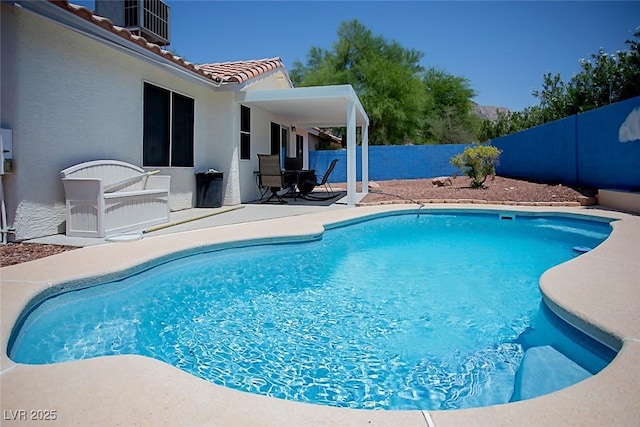 6249 Halehaven Dr, Las Vegas, NV 89110 - view of swimming pool featuring a patio and a fenced backyard