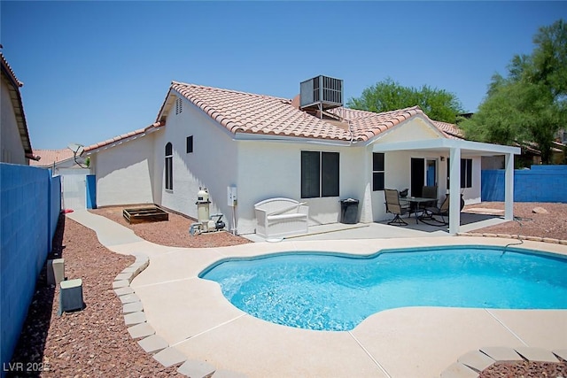 6249 Halehaven Dr, Las Vegas, NV 89110 - rear view of property with a tile roof, a fenced backyard, a patio area, and stucco siding