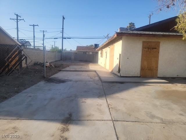 4430 Judson Ave, Las Vegas, NV 89115 - view of yard featuring concrete driveway