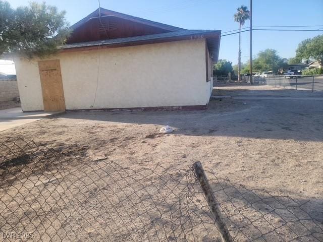 4430 Judson Ave, Las Vegas, NV 89115 - view of home's exterior featuring stucco siding