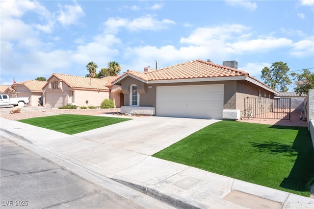 5524 Cleary Ct, Las Vegas, NV 89108 - view of front of house featuring stucco siding, a tile roof, an attached garage, driveway, and a gate