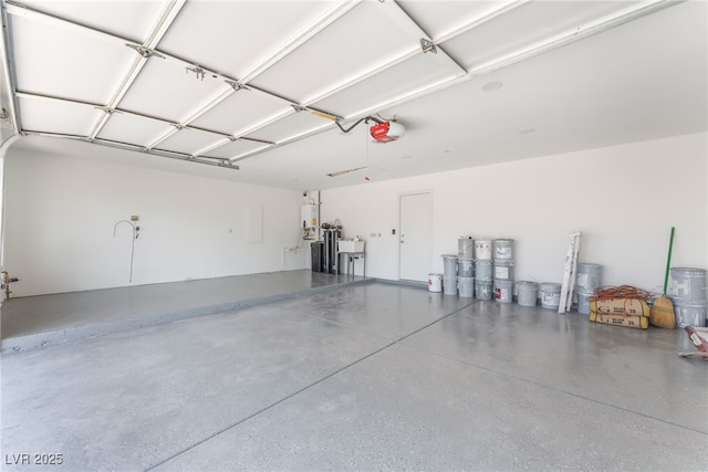 5524 Cleary Ct, Las Vegas, NV 89108 - garage featuring a garage door opener and water heater