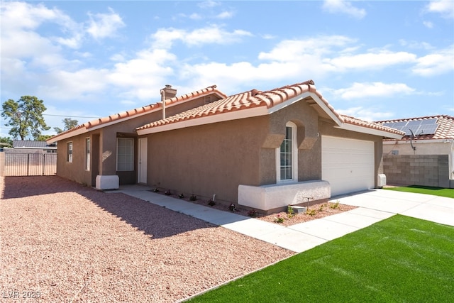 5524 Cleary Ct, Las Vegas, NV 89108 - view of front of house featuring concrete driveway, an attached garage, stucco siding, and a tiled roof