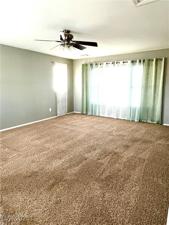 10450 Badger Ravine St, Las Vegas, NV 89178 - carpeted empty room featuring ceiling fan and baseboards