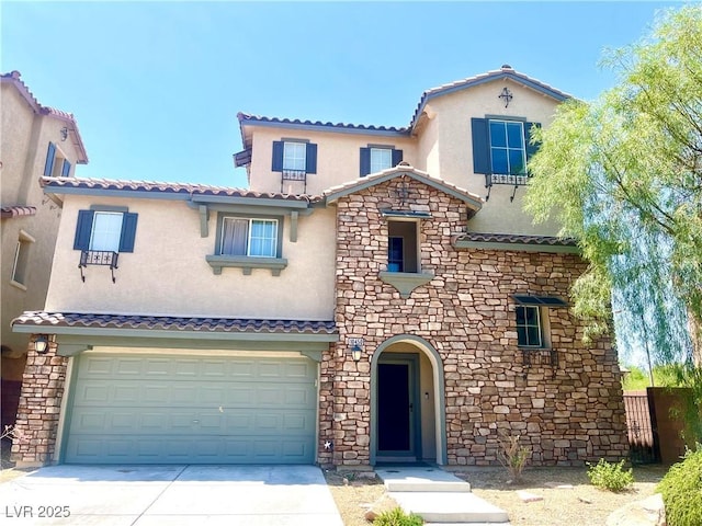 10450 Badger Ravine St, Las Vegas, NV 89178 - mediterranean / spanish home featuring stone siding, stucco siding, concrete driveway, a garage, and a tile roof