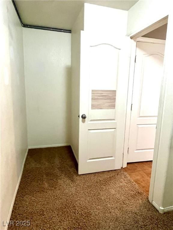 10450 Badger Ravine St, Las Vegas, NV 89178 - hallway with carpet flooring