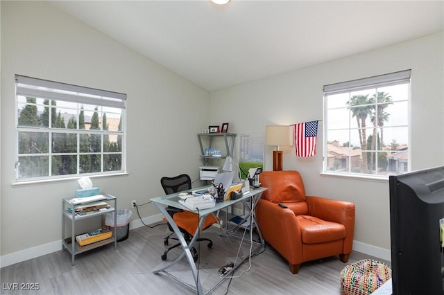 9836 Russett Wood Cir, Las Vegas, NV 89117 - office area featuring lofted ceiling and wood finished floors
