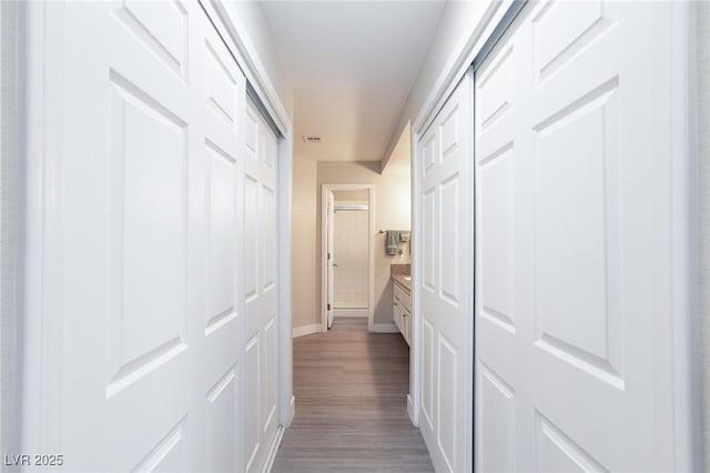 9836 Russett Wood Cir, Las Vegas, NV 89117 - hallway featuring baseboards and wood finished floors