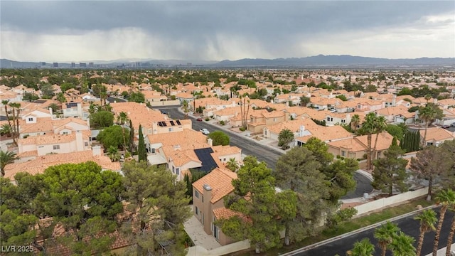 9836 Russett Wood Cir, Las Vegas, NV 89117 - aerial view of property's location with nearby suburban area and a mountainous background