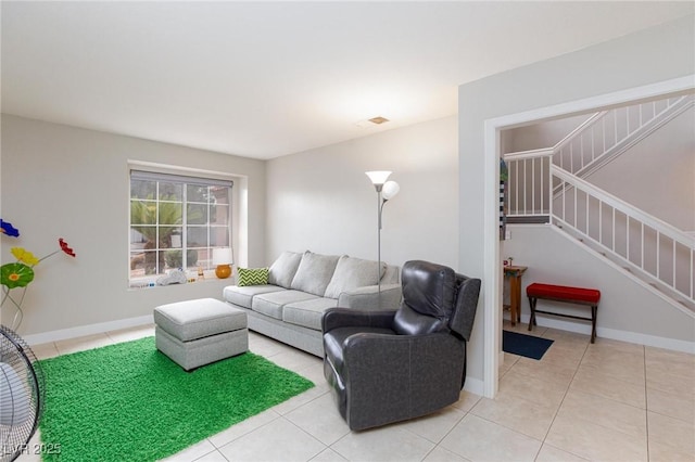 9836 Russett Wood Cir, Las Vegas, NV 89117 - living area featuring light tile patterned floors and stairs