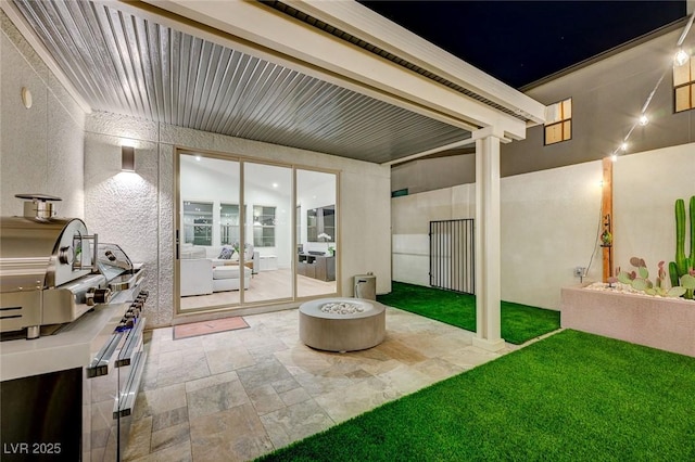 2670 Skylark Trail St, Henderson, NV 89044 - view of patio / terrace with an outdoor fire pit