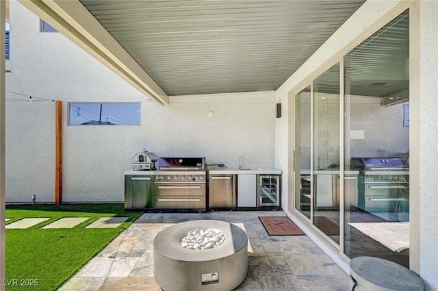 2670 Skylark Trail St, Henderson, NV 89044 - view of patio / terrace with exterior kitchen and wine cooler