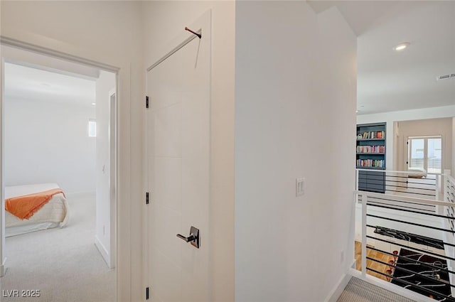 2670 Skylark Trail St, Henderson, NV 89044 - corridor with carpet flooring, an upstairs landing, and recessed lighting