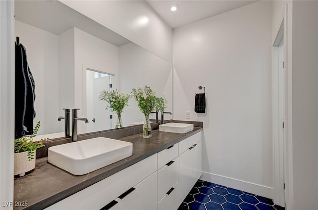 2670 Skylark Trail St, Henderson, NV 89044 - full bath featuring double vanity, tile patterned flooring, and recessed lighting