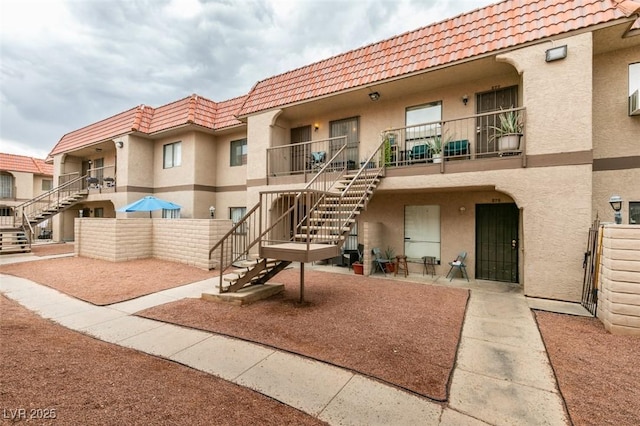 4300 N Lamont St Unit 275, Las Vegas, NV 89115 - view of building exterior with stairs