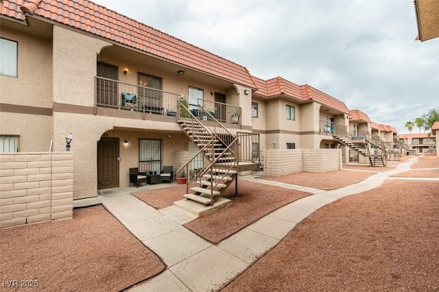 4300 N Lamont St Unit 275, Las Vegas, NV 89115 - view of property with stairway and a residential view