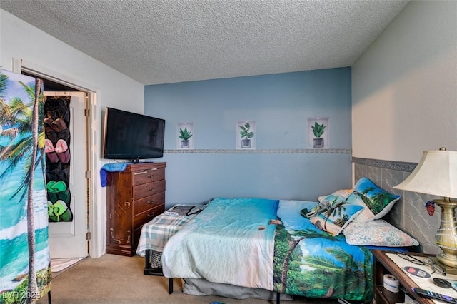 4300 N Lamont St Unit 275, Las Vegas, NV 89115 - bedroom featuring carpet and a textured ceiling
