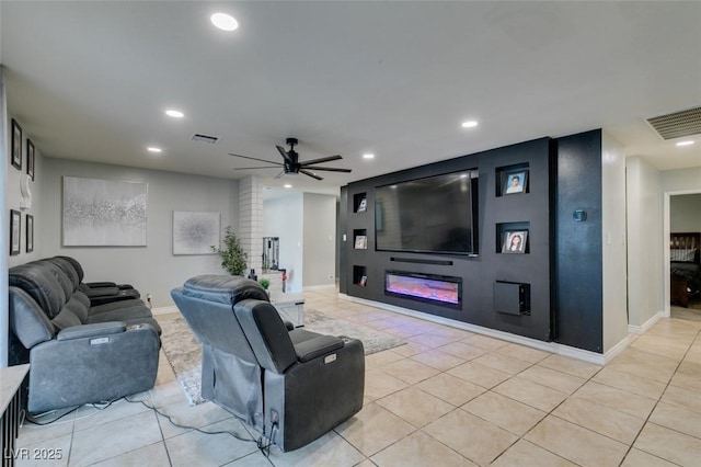1705 Ivanhoe Way, Las Vegas, NV 89102 - living room featuring a ceiling fan, recessed lighting, light tile patterned flooring, and a glass covered fireplace