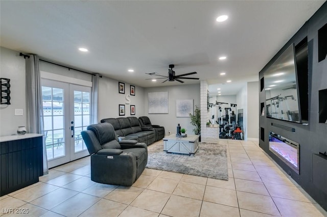 1705 Ivanhoe Way, Las Vegas, NV 89102 - living area featuring french doors, recessed lighting, light tile patterned flooring, a ceiling fan, and a glass covered fireplace