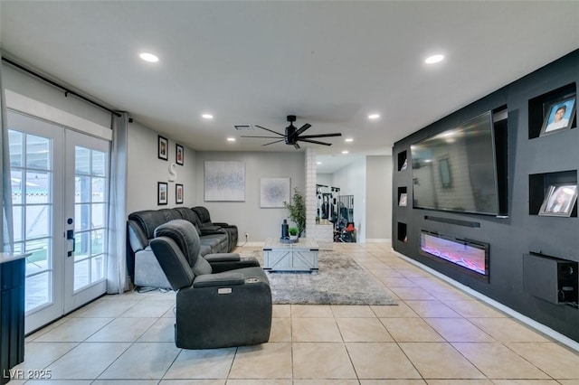 1705 Ivanhoe Way, Las Vegas, NV 89102 - living room featuring french doors, recessed lighting, ceiling fan, light tile patterned flooring, and plenty of natural light