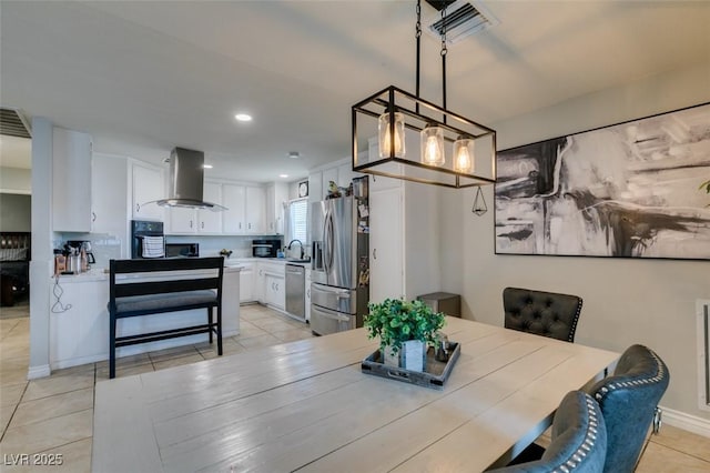 1705 Ivanhoe Way, Las Vegas, NV 89102 - dining space featuring light tile patterned floors and recessed lighting
