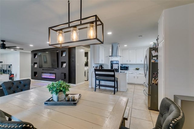 1705 Ivanhoe Way, Las Vegas, NV 89102 - dining space with washing machine and clothes dryer, light tile patterned flooring, recessed lighting, and a ceiling fan