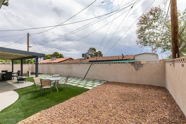 1705 Ivanhoe Way, Las Vegas, NV 89102 - fenced backyard featuring a patio area