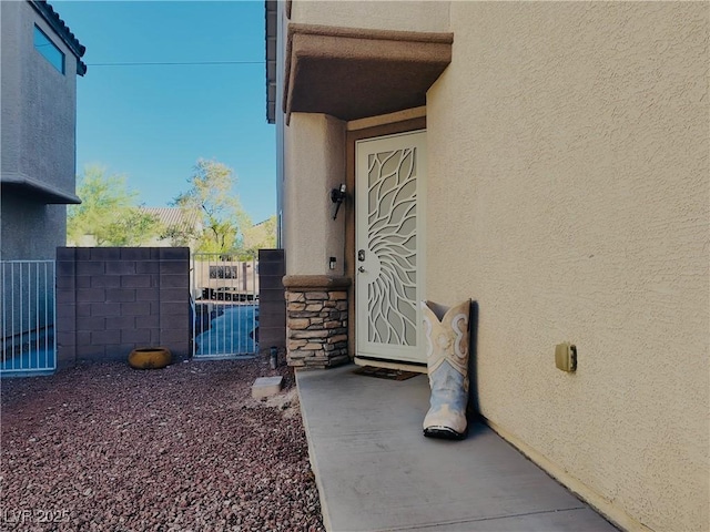 3009 Austin Pale Ave, North Las Vegas, NV 89081 - entrance to property featuring stucco siding and a gate