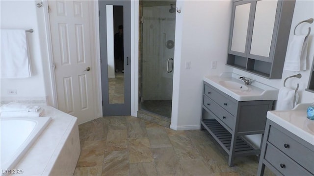 2587 Mizzoni Cir, Henderson, NV 89052 - full bath with two vanities, a stall shower, and a garden tub