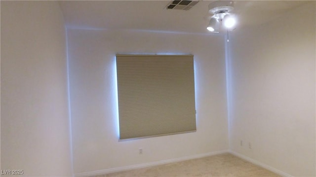2587 Mizzoni Cir, Henderson, NV 89052 - empty room featuring baseboards and light colored carpet
